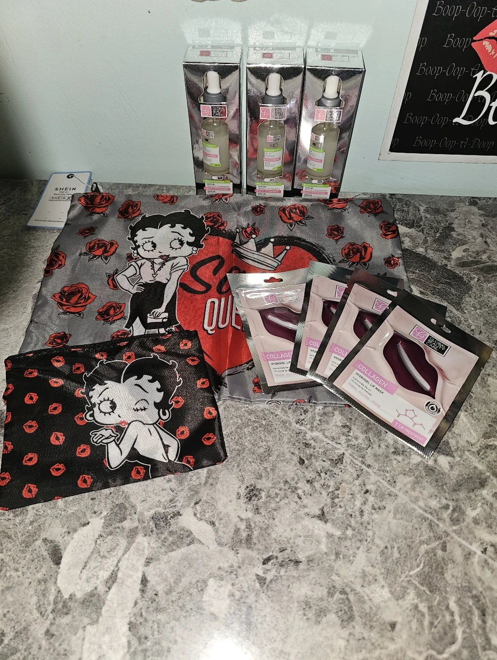 9pc Betty Boop Sassy Queen Tote, Cosmetic Pouch, 3 Serums & 4 Lip Masks!